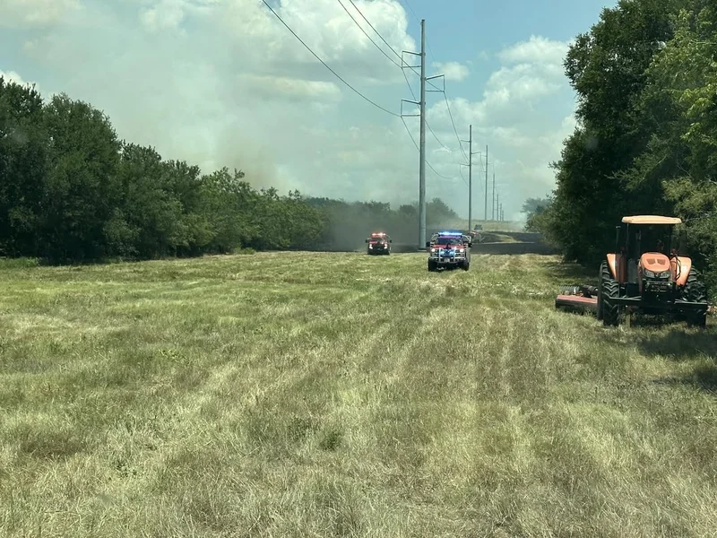 Emergency Crews Battle Large Brush Fire Near FM 987