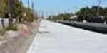 Construction: Concrete being poured on southbound lanes of Pinson Road