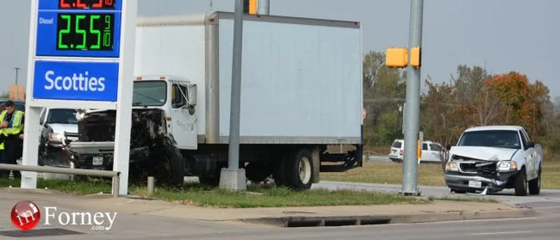 Box truck involved in earlier wreck unhooks from wrecker while in-tow, strikes pickup truck