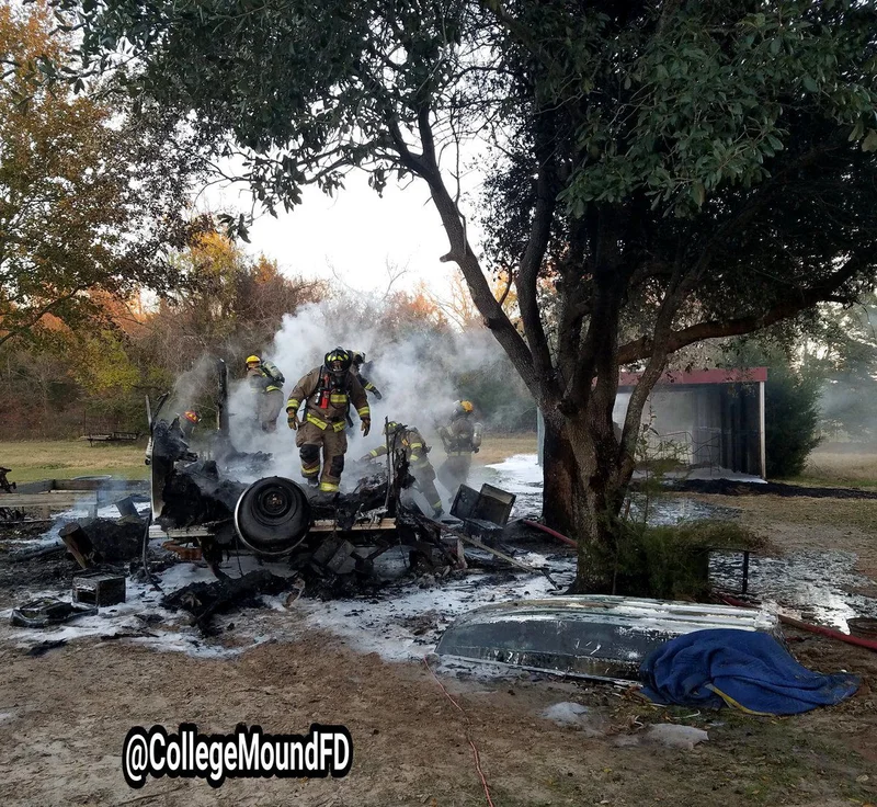 Travel trailer destroyed in Monday fire as firefighters save nearby structure