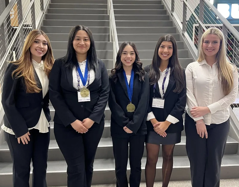 11 Forney DECA Students Advance to State