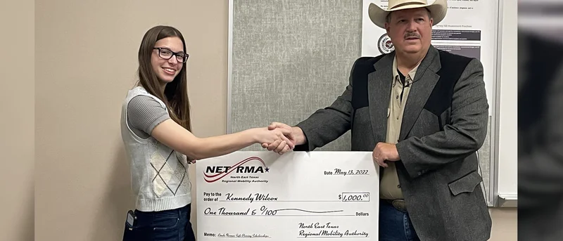 Forney High School senior Kennedy Wilcox presented with Linda Thomas Safe Driving Scholarship