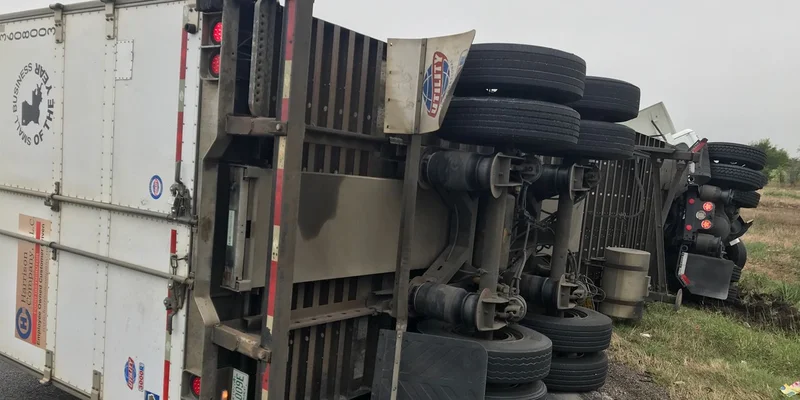 Overturned 18-wheeler, HAZMAT cleanup closes westbound Interstate 20