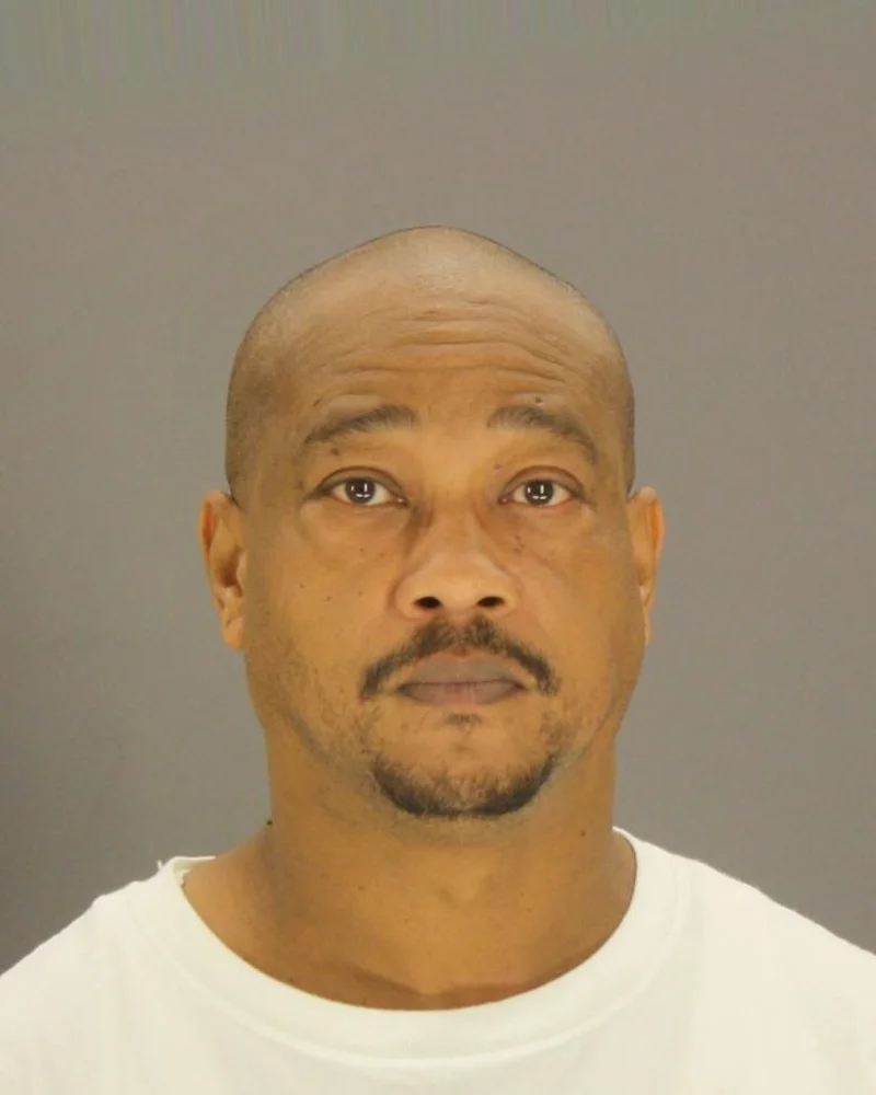 Man arrested after woman's body discovered burning near Dallas-Kaufman County line