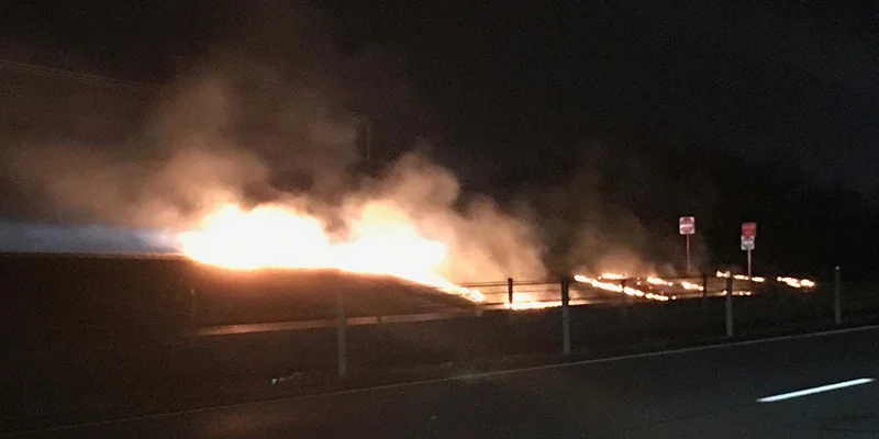18-wheeler strikes guardrail on U.S. Highway 80, sparking grass fire