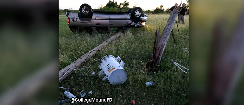Two escape serious injury after striking utility pole, snapping it, and overturning