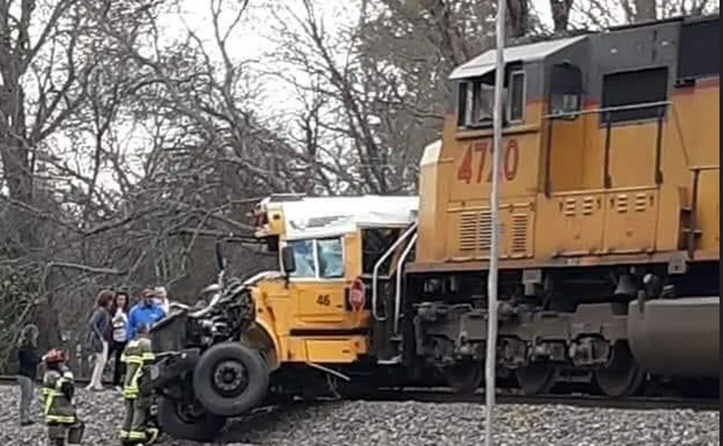 One student killed, another student and driver injured after bus and train collide in Athens