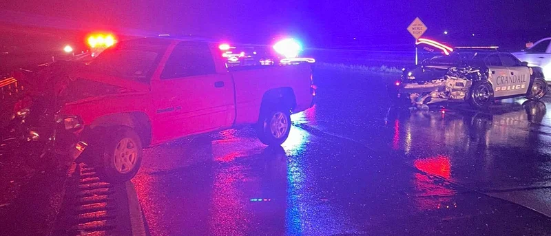 Crandall Police Department vehicle struck while directing highway closure due to previous crash