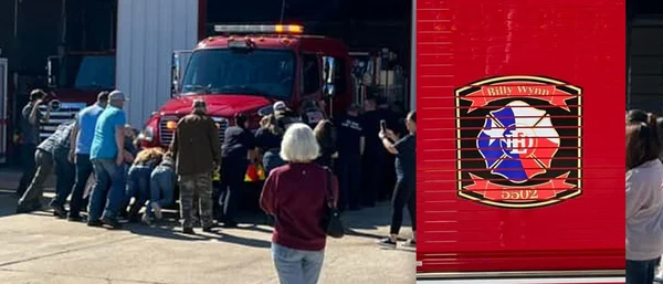 Elmo Fire Engine Elmo Fire Department, community members push-in new fire engine into ...